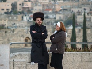 An Orthodox couple on Shabbat in Jerusalem, outside the Western Wall. Photo: wiki commons.