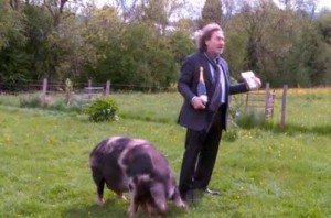 Howard Jacobson wins a pig. Photo: The Telegraph.