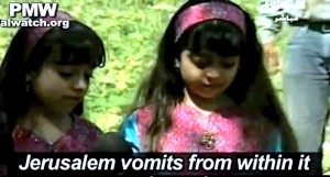 Screen shot of two children of PA TV reciting poem referring to Jews as "barbaric monkeys" and "wretched pigs." Photo: Youtube/PMW.
