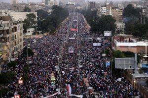 Millions protest in mass demonstrations across Egypt on Friday, July 26, 2013. Photo: Screenshot.