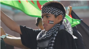 AlQuds Child who addressed the Al Quds Day rally with Anti-Zionist hate speech. Photo: Screenshot.