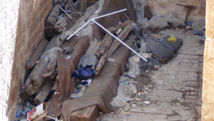 Ancient cedar beams, seemingly discarded, hidden under rubbish on the Temple Mount. Photo: The Temple Institute.