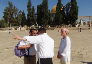 Rabbi Chaim Richman, Director of The Temple Institute, pretending to give a tourist directions while surreptitiously chanting Jewish prayers, on the Temple Mount, on August 11, 2013. Photo: The Temple Institute.