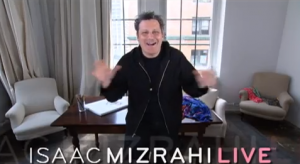Fashion icon Isaac Mizrahi in television commercial for his "Isaac Mizrahi Live!" home shopping program on QVC, which was recorded and broadcast on Yom Kippur. Photo: Screenshot.