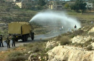 PNN photo of IDF troops employing the "Skunk" spray. Photo: Screenshot / PNN.