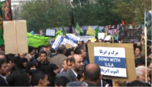 Iranian protesters in Tehran, in front of the former U.S. Embassy, on the anniversary of its 1979 takeover, in November 4, 2013. Photo: Screenshot / FARS.