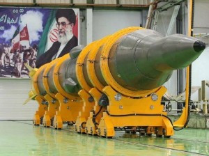 An Iranian missile in front of portrait of the Islamic Republic's Supreme Leader.