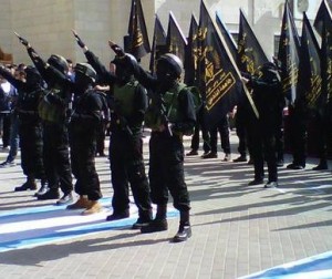A rally on November 5, 2013, complete with Nazi salutes and rifles, held by students at Al-Quds University. Photo: Mideast Dispatches/Tom Gross.