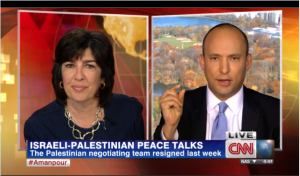 Israel Economy Minister Naftali Bennett showing a 2,000 year old Jewish coin to CNN's Christiane Amanpour, on November 18, 2013. Photo: Screenshot / CNN.