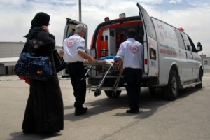 An Arab patient from Gaza enters an ambulance for Israel to receive emergency treatment. Photo: IDF.