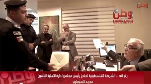 Palestinian Authority police raiding Canadian investor Mohamed Al Sabawi's Ramallah office. Photo: Screenshot / Wattan TV YouTube video / Gatestone Institute.