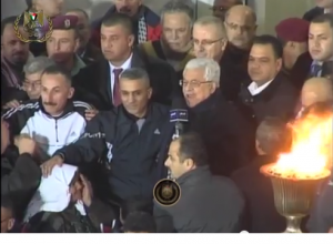 Palestinian Authority President Mahmoud Abbas embraced the returning 26 convicts from Israeli jails as "heroes" in Ramallah, on December 30, 2013. Photo: Screenshot / WAFA.