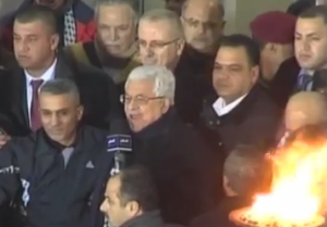 Palestinian Authority President Mahmoud Abbas embraced the returning 26 convicts from Israeli jails as "heroes" in Ramallah, on December 30, 2013. Photo: Screenshot / WAFA.