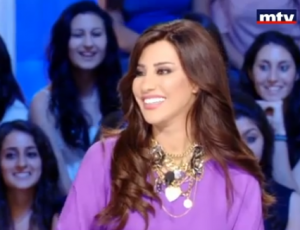 Lebanese singer Najwa Karam, who has sold 50 million records and was the Arab face of the L'Oreal cosmetics line until last year, on the Arabic-language interview program 'Talk of the Town,' in an episode aired on June 28, 2012. Photo: Screenshot.