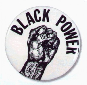 Black Power symbol, in a pin. Photo: Screenshot / VEERAMANI.