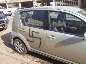 One of 10 swastikas sprayed on cars parked in Safed, Israel, on January 6, 2013. Photo: Screenshot / Ma'ariv.