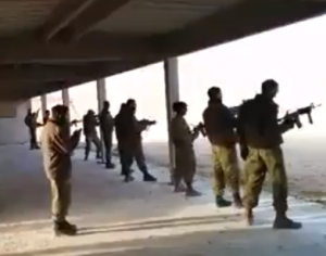 IDF soldiers on watch listen to Megillah of Esther. Photo: Screenshot / Facebook.