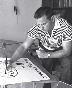 Raanan Lurie, drawing a political cartoon, in 1961. Photo: WikiCommons.