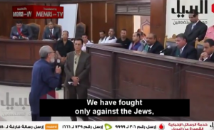 Muhammad Badi, the 'General Guide' of the Muslim Brotherhood in Cairo, telling judges, "we have only fought against Jews." Photo: Screenshot.