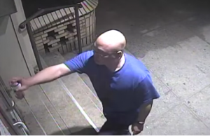 spraypaint Security camera footage of former policeman Michael Setiawan scrawling graffiti on the Bnos Zion Bobov Elementary School. Photo: Screenshot.