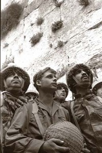 The iconic photograph of Israeli soldiers gazing at the Western Wall, in Jerusalem, for the first time in their lives, after entering the city as Israel beat the invading Arab armies in 1967. Photo: Israel Knesset.