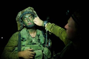 An IDF soldier being prepared for battle in Gaza.