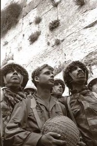 The iconic photograph of Israeli soldiers gazing at the Western Wall, in Jerusalem, for the first time in their lives, after entering the city as Israel beat the invading Arab armies in 1967. Photo: Israel Knesset.