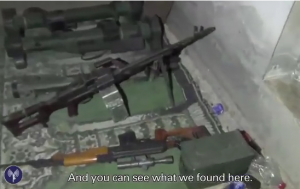 Guns discovered by the IDF on a prayer rug in a basement prayer room of a mosque, protecting a secret tunnel. Photo: Screenshot / IDF.