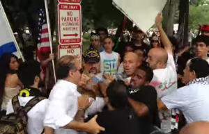 Manuel E. Vega, a 29-year-old U.S. Marine Corps veteran, (wearing a Marine cap, in center, was assaulted at a pro-Hamas rally outside the White House for supporting Israel. Photo: Screenshot. 