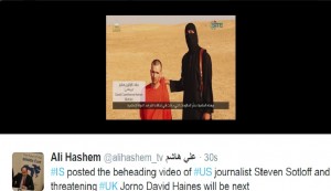 ISIS captor with David Haines Photo: SITE Intel screenshot