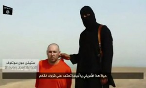 Stephen Sotloff with ISIS captor Photo: screengrab
