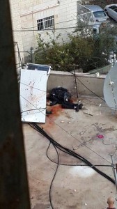 Body of Mutaz Hijazi on roof, after shootout with police. Photo: screenshot