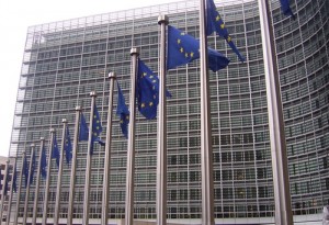 EU flags in front of the European Commission building in Brussels. Photo: Amio Cajander via Wikimedia Commons.