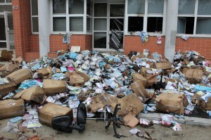 Debris outside the Charlie Hebdo offices in Paris following the November 2011 attack there. The BBC refused to call the gunmen "terrorists." Photo: Pierre-Yves Beaudouin.