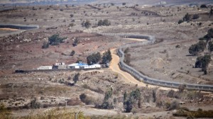 Israeli military outpost and heavily patrolled border fence near the now-shuttered Queneitra crossing point with Syria in the Golan Heights. Photo: Dave Bender