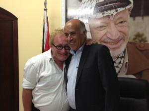 Tuvia Tenenbom (left) with Jibril Rajoub, former head of the Palestinian Authority's Preventative Security Force, in Ramallah. Behind them is a photo of Yasser Arafat. Photo: Gefen Publishing.