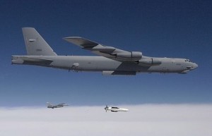 A B-52 bomber releases a Massive Ordnance Penetrator, a 30,000-pound bunker buster bomb. Photo: Wikipedia