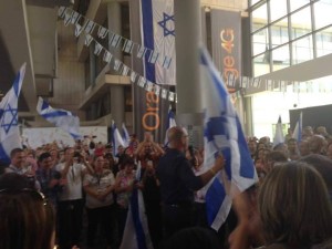 Israeli flags fly at Orange headquarters in Israel. Photo: Facebook. 
