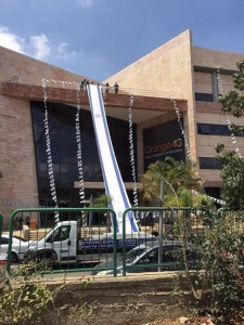 An Israeli flag at Orange headquarters in Tel Aviv. Photo: Facebook.  