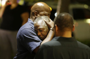 Victims of the deadly attack at a Charleston church embrace following the violence. Photo: Courtesy Jewish Federation of Charleston, SC.  