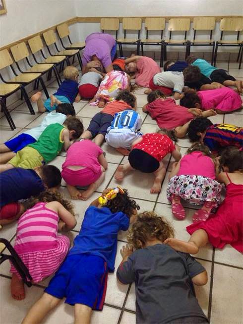 Israeli children during red alert sirens. Photo: Elder of Ziyon.