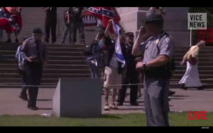 KKK protesters were caught on video spitting, stomping on and ripping apart an Israeli flag. Extremist groups proliferated in the United States in 2015. Photo: Screenshot.