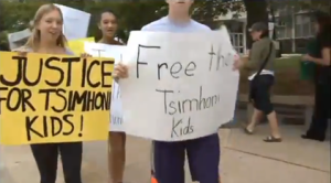 Friends and community members protest the jailing of the three Tsimhoni children by a Detroit judge. Photo: Screenshot from YouTube.