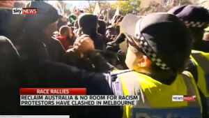 Police and demonstrators clash in Melbourne as Reclaim Australia and anti-racism demos meet. Photo: Screenshot. 