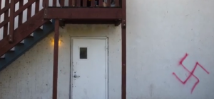 A swastika that was spray-painted on the Alpha Epsilon Pi (AEPi) Jewish fraternity house at University of California, Davis. Photo: YouTube screenshot via Sacramento Bee.