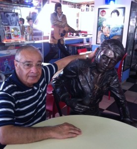 Uri Yoeli (left) at the Elvis Inn, his restaurant/convenience store/gas station in Neve Ilan, Israel. Photo: Deborah Fineblum Schabb.