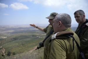 IDF Chief of Staff Lt. Gen. Gadi Eizenkot looks over the Israel-Syria border on Wednesday. Photo: IDF Spokesperson's Unit.