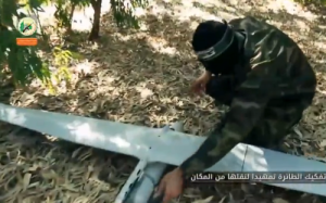 A Hamas video claims to show the Palestinian terrorist group rebuilding an Israeli drone that crashed in Gaza. Photo: Screenshot.