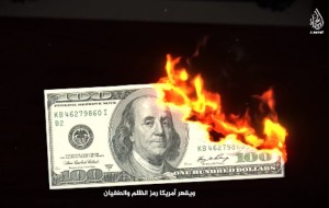 The Islamic State group vowed to weaken the U.S. dollar and replace it with gold. Photo: screenshot, Islamic State video.