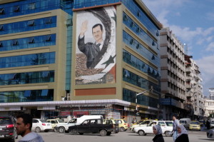 A Bashar al-Assad mural in Latakia, Syria. Photo: Emesik via Wikimedia Commons